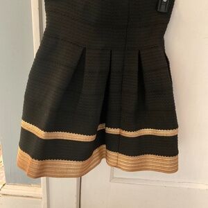 Black skirt with gold accents